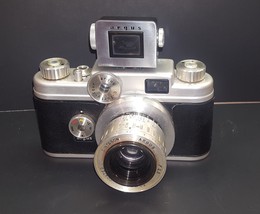 1964 Argus Camera, rangefinder, telephoto lens, leather cases and flash - $80.00