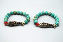 Turquoise Stone Carved Bead Bracelets Set of 2 Fish Hardware Stretchy Red Accent - £38.57 GBP