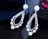 Rconia paved luxury big long dangle pearl wedding earrings for women elegant party thumb155 crop