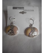 Vintage Estate Costume dangle Earrings swirly creamy beige and silver - $141.36 MXN