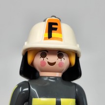 VINTAGE 1997 PLAYMOBIL GIRL FIREFIGHTER FIGURE KEYCHAIN FIRE FIGHTER W/ ... - $9.50