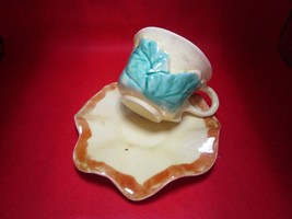 Italian pottery Majolica tea cup and saucer yellow - $39.60