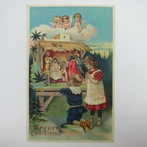 Christmas Postcard Children Pray Nativity Scene Cherub Angels Embossed Antique - £11.74 GBP