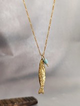 Gold necklace. 14 karat yellow gold fish necklace with the good eye stone - £927.08 GBP