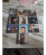 #23 lot 10 Country Western audio CDs George Strait Elvis Presley Alan Ja... - $290.47 MXN