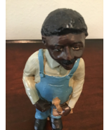 Figurine of Black Farmer holding a fiddle - $307.86 MXN