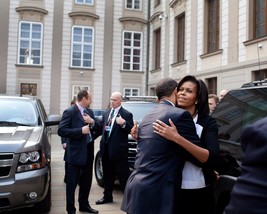 President Barack Obama hugs First Lady Michelle Obama in Prague Photo Print - £7.17 GBP
