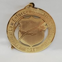 National Law Enforcement Officers Memorial 2011 Gold Colored Ornament Trinket  - $14.84