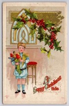 Christmas Greetings Boy Holding Toys And Stocking Postcard C39 - $3.95