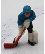 Blue and White Hockey Player One Inch Minature Plastic Figure - $187.97 MXN