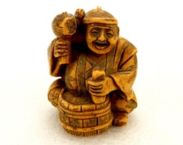 Sitting Buddha Hammering A Barrel, 2.5&quot; Ivory Resin Figurine, Indian Home Decor - £11.71 GBP