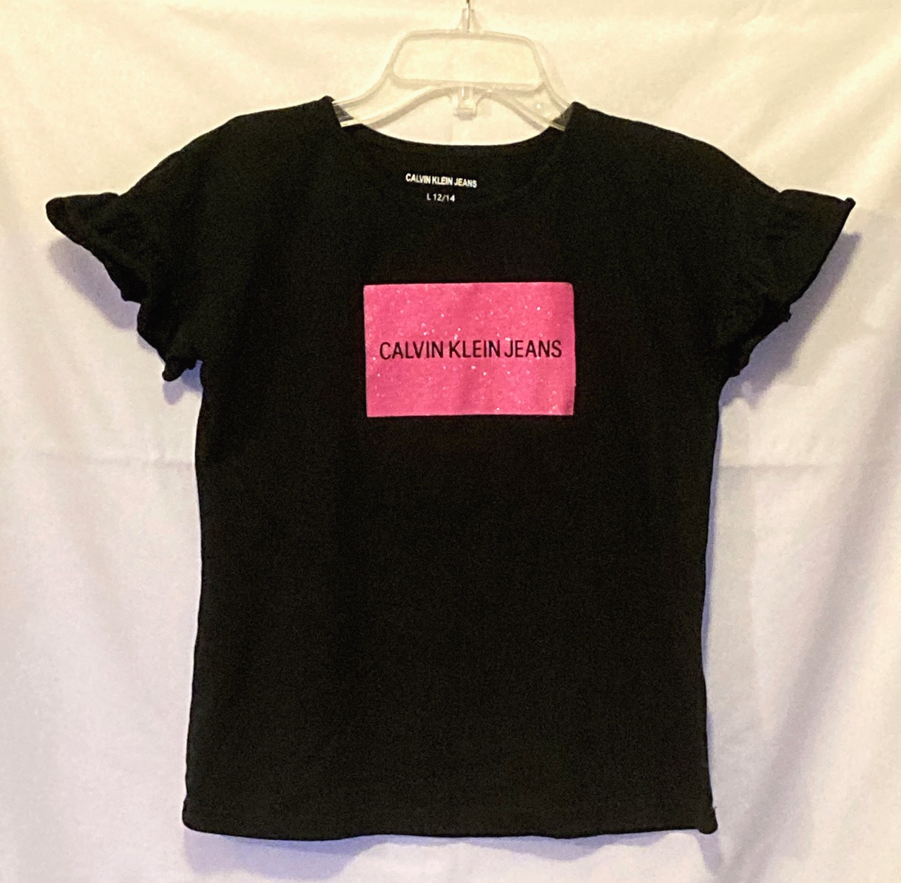 Calvin Klein Jeans girls black knit top pink glitter ruffle sleeves size L 12 14 - $5.00