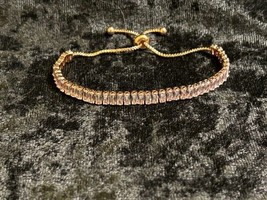 Adjustable 8&quot; Gold Tone Bolo Style Tennis Bracelet with Cut Crystal Stones - £3.05 GBP