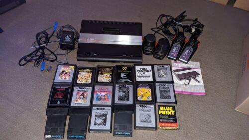 Atari 7800 System 18  2600 And 7800 games all work Joysticks And Paddle Controls - £210.18 GBP