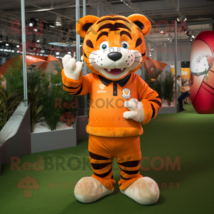 Orange Tiger mascot costume character dressed with a Rugby Shirt and Hat pins - £973.64 GBP