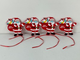 Lot of 4 Christmas Ornament Santa Claus with Mask funny bringing supplies - £7.97 GBP