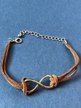 Double Strand Brown Suede Leather Cord w Silvertone Infinity Twist Center Bracel - £9.08 GBP