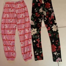Set of 2 Girl Pants. Pink Large And Floral Black 14 Old Navy And American Market - £11.04 GBP