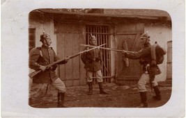 World War 1 real photo post card: German soldiers spar with bayonets - $31.68