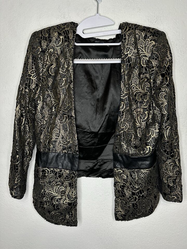 BEBE Addiction Lasercut Gold And Black Women’s Jacket Size 8 - $39.99
