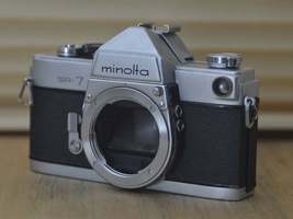 Gorgeous Minolta SR7 60s SLR (Body only). These are very solid and striking vint - $95.00