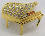 Vintage Trifari signed Grand Piano Gold Brooch with Pave Rhinestones - $58.41