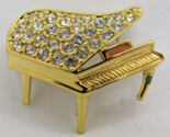 Vintage Trifari signed Grand Piano Gold Brooch with Pave Rhinestones - $58.41