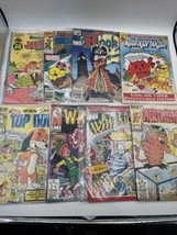 Lot of 8 VGT comics, 1st issues, top dog, hook, Richie rich ect. - £18.94 GBP
