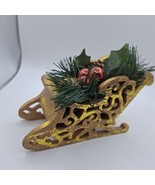 Resin Golden Santa Sleigh With Walnut Holly And Pine Cone Inside - $6.13 CAD