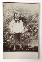 Antique RPPC Adorable Child Standing in Overgrown Brush Garden Solio - $6.50