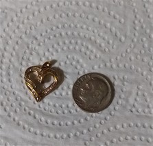 10K Yellow Gold Diamond Round & Baguette Heart Pendant, 0.35(TCW), 1"L x 3/4"W - $139.99