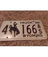 1982 WYOMING BUCKING COWBOY LICENSE PLATE - $34.65