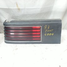 GM Pontiac 1982-1983 6000 LH Driver Tail Light Assembly Dark Gray Trim OEM Used - £21.22 GBP