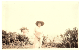 RPPC Postcard Woman in Dress Big Hat in Garden - £4.66 GBP