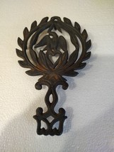 Vintage Cast Iron Trivet Eagle and Heart Wreath Footed Farmhouse Decor - $10.85