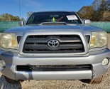 2005 2011 Toyota Tacoma OEM Front Bumper 1E7 Silver Streak Mica Has Damage - £223.65 GBP