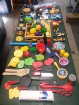 lot of kids toys. with vintage McDonald's straw holder's.  - $19.00