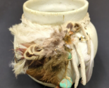 Pottery with Feathers - $14.84