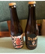 Lot of 2 Large EMPTY RUSH Beer Bottles  Geddy Lee - $658.39 MXN