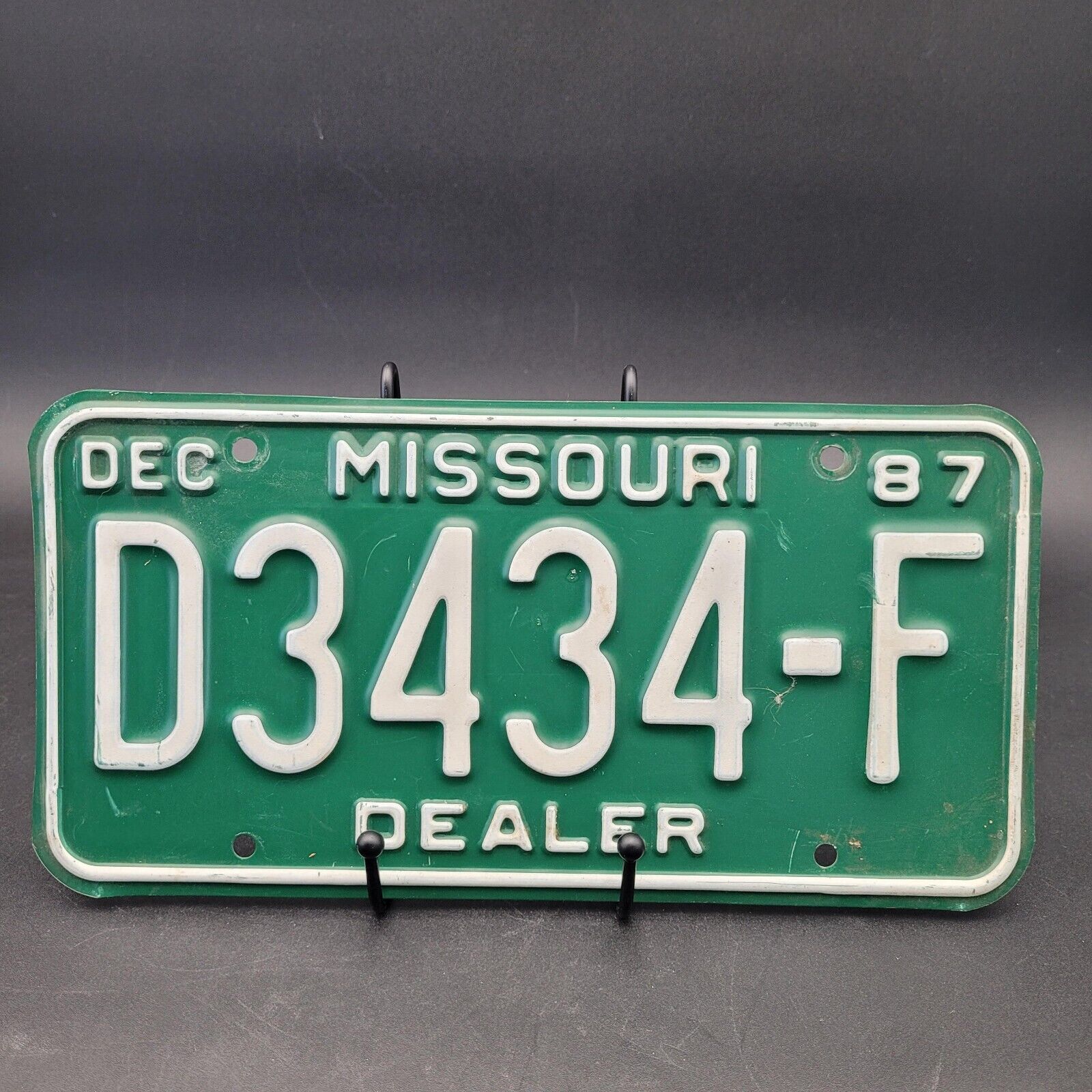 Primary image for Vintage Aluminum DEC 1987 Green White Missouri Dealership License Plate D3434-F
