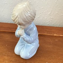 Gently Used Roman Marked Brown Haired Praying Boy in Light Blue Pajamas Porcelai - £8.72 GBP