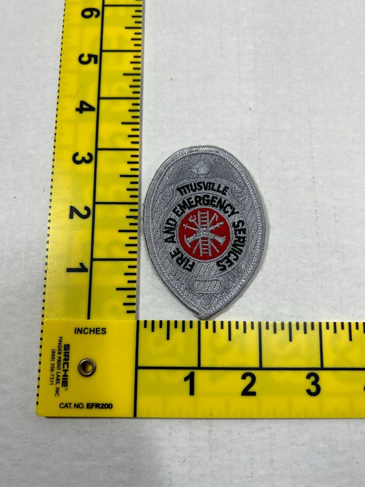 Titusville Florida Fire and Emergency Services Silver Badge Patch obsolete - $14.85