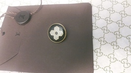 Louis Vuitton Stamped 20 mm single button  - $28.00