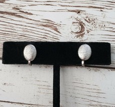 Vintage Clip On Earrings - Dainty Silver Tone Patterned Oval - $12.99