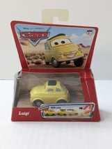 NEW 2005 Disney Pixar Cars Luigi Yellow Pullbax Motor Zippin Car Figure NIP NOS - £11.47 GBP