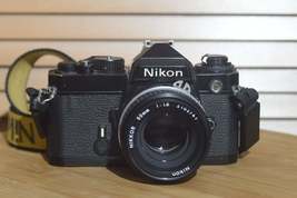 Nikon Black FE With Nikkor 50mm f1.8 Lens Starter Pack. Comes with Lens,... - £338.13 GBP+