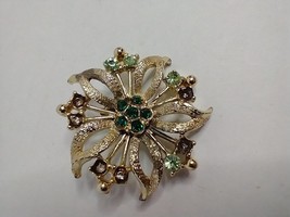 Flower shaped Brooch Gold Tone with green stones pin-damage - $7.91