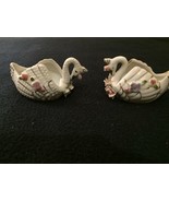 Pair of decorative porcelain swans each with cavity to hold whatever you... - $4.50