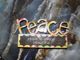 DEMDACO Colorful Devotions Peace sculpture by Holly Christine NEW 2010 - $18.00