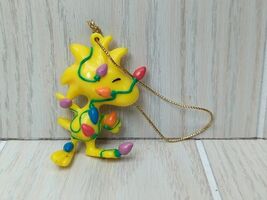 Whitmans Peanuts Woodstock bird tangled in Christmas Tree Lights Ornament - $9.77
